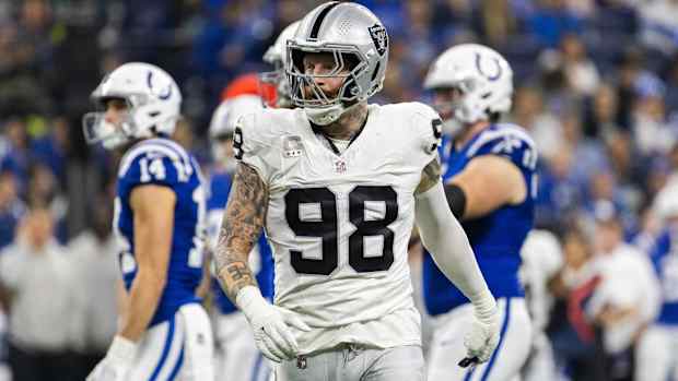 Raiders pass rusher Maxx Crosby looks on during a game vs. the Indianapolis Colts.